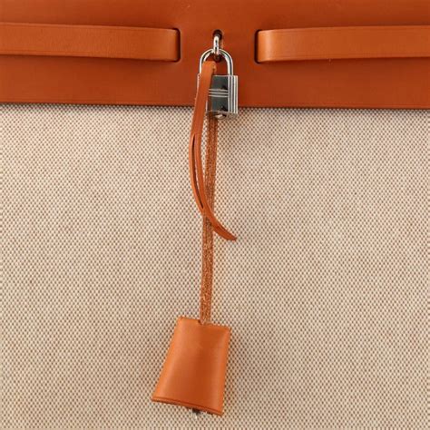 hermes herbag toile and leather mm|Hermès.